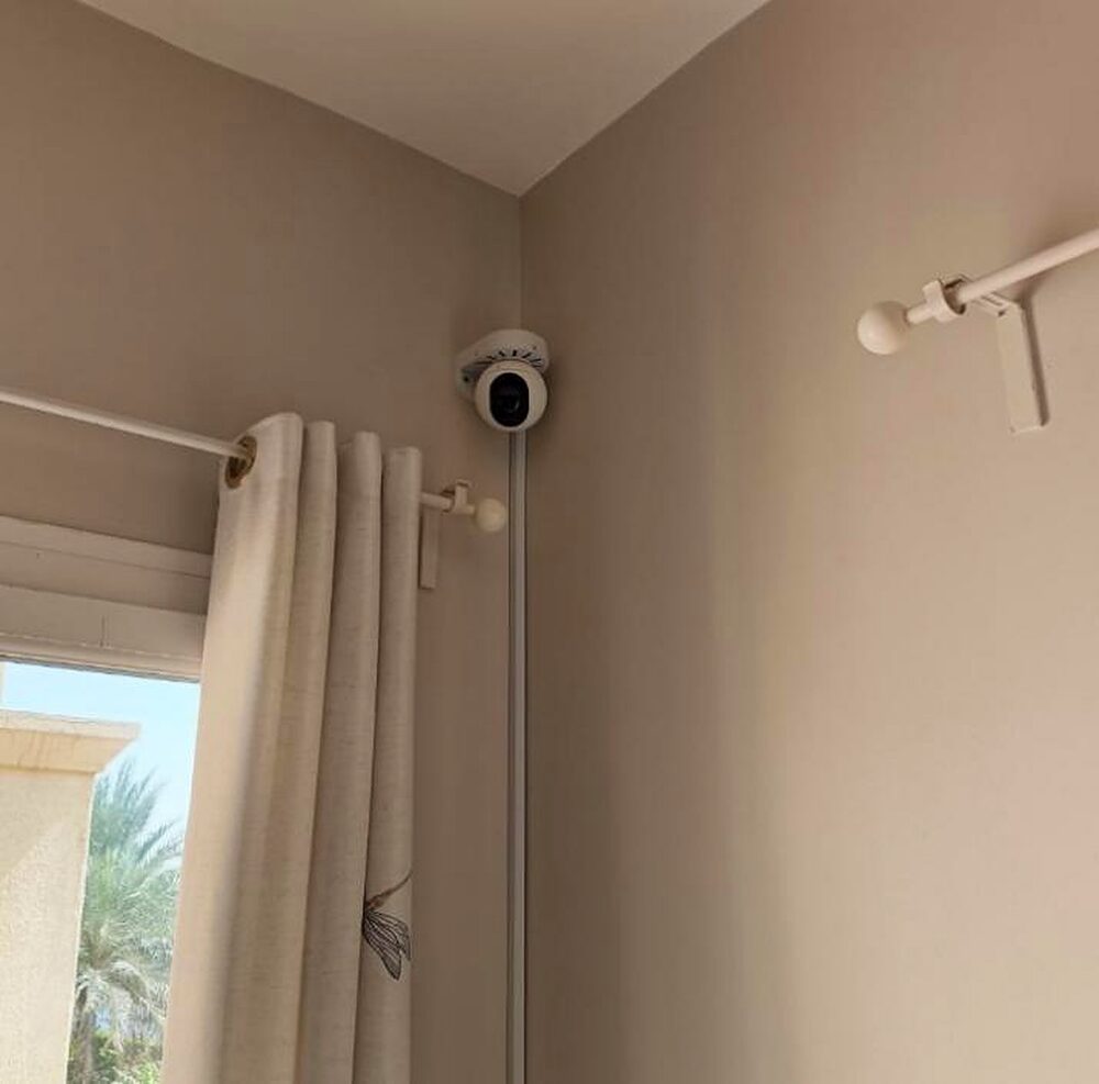 A ceiling camera inside an apartment in a Dubai tower