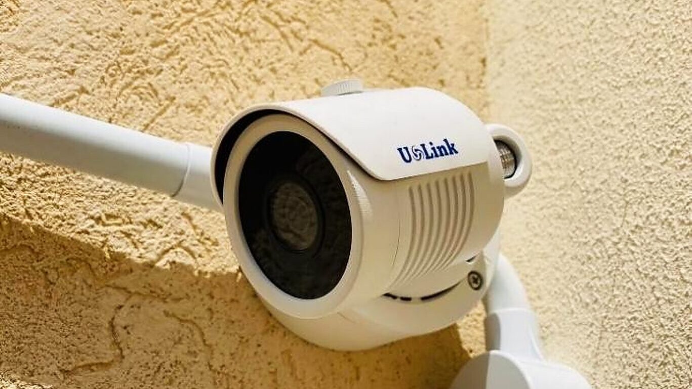 A weatherproof bullet camera mounted on a wall in Dubai