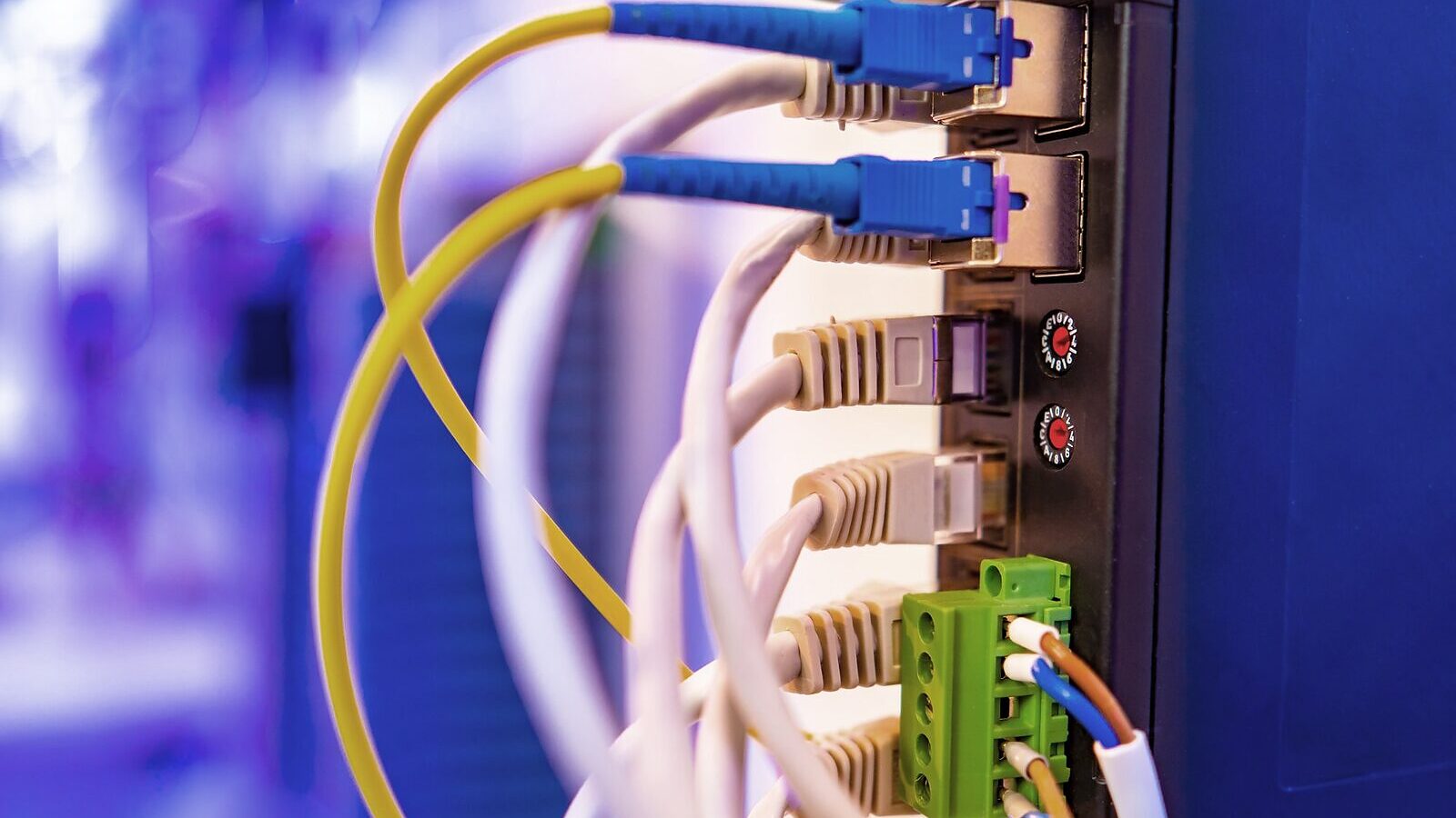 Patch cables terminated into a network panel
