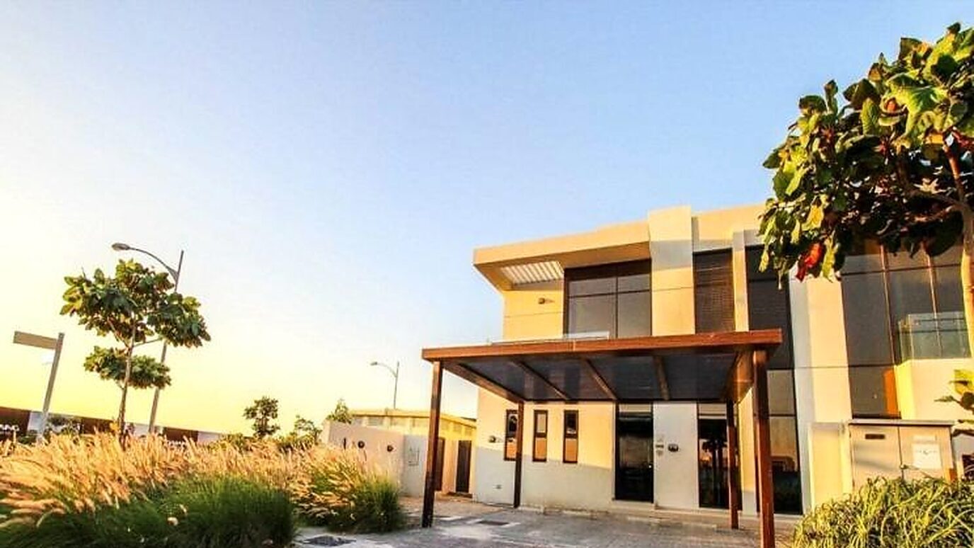 A villa in a Dubai community at dusk