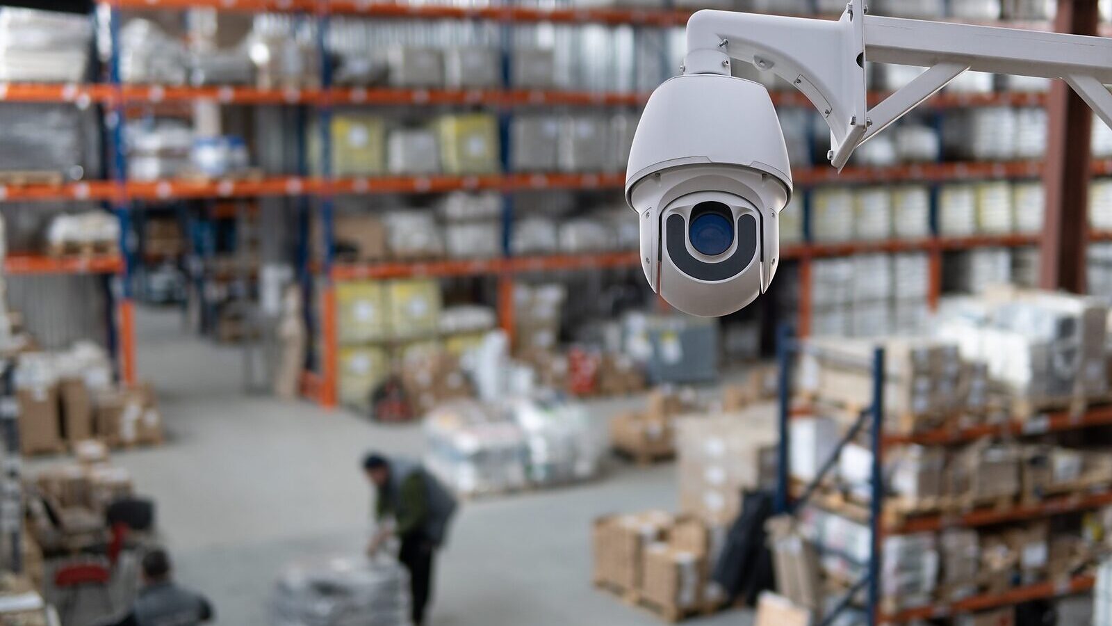 A PTZ camera covering the aisles of a warehouse